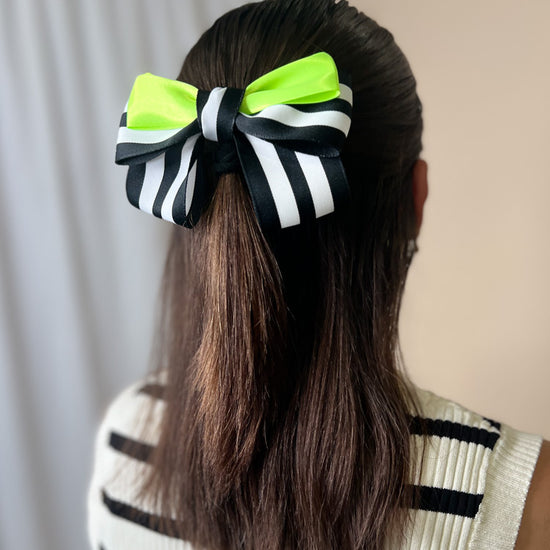 Handmade betelgeuse themed hair bow for halloween