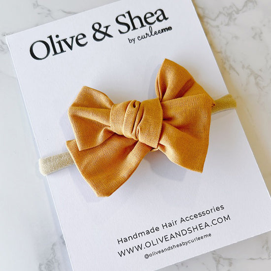 Pinwheel Bow Baby Headband - Mustard
