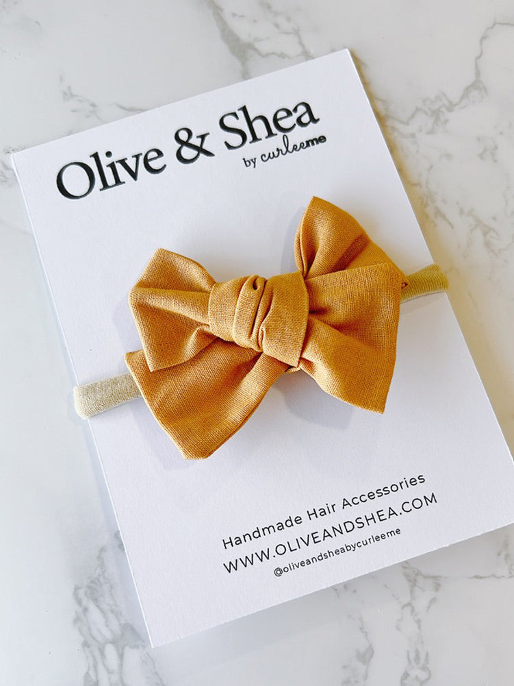 Pinwheel Bow Baby Headband - Mustard