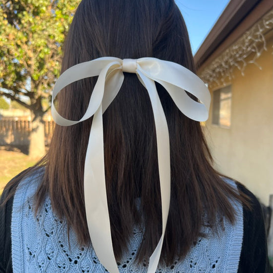 Girl wearing Lana Satin Double Droop Bow