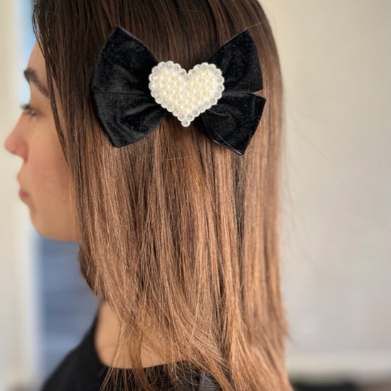 Girl wearing Lovella Pigtail Bow