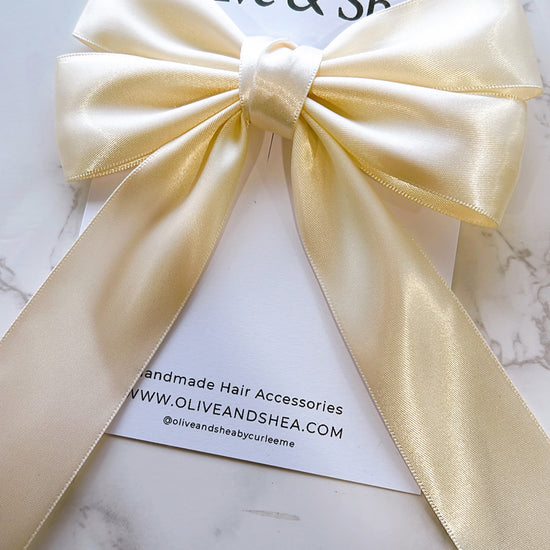 Stephanie Ivory Bow