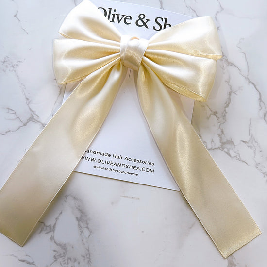 Stephanie Ivory Bow