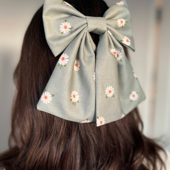 Girl Wearing Flower Garden Bow