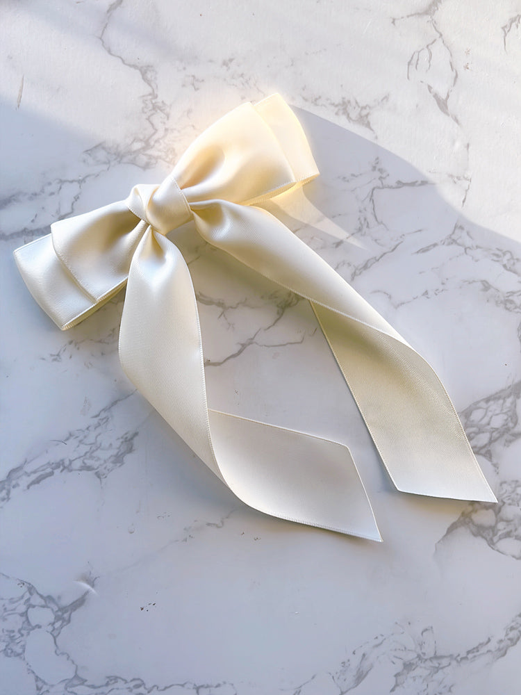 Handmade ivory satin ribbon bow with long tails