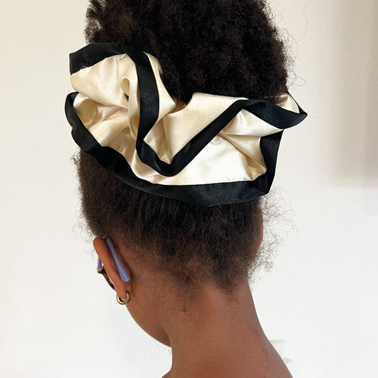 Cream satin scrunchie with black edges