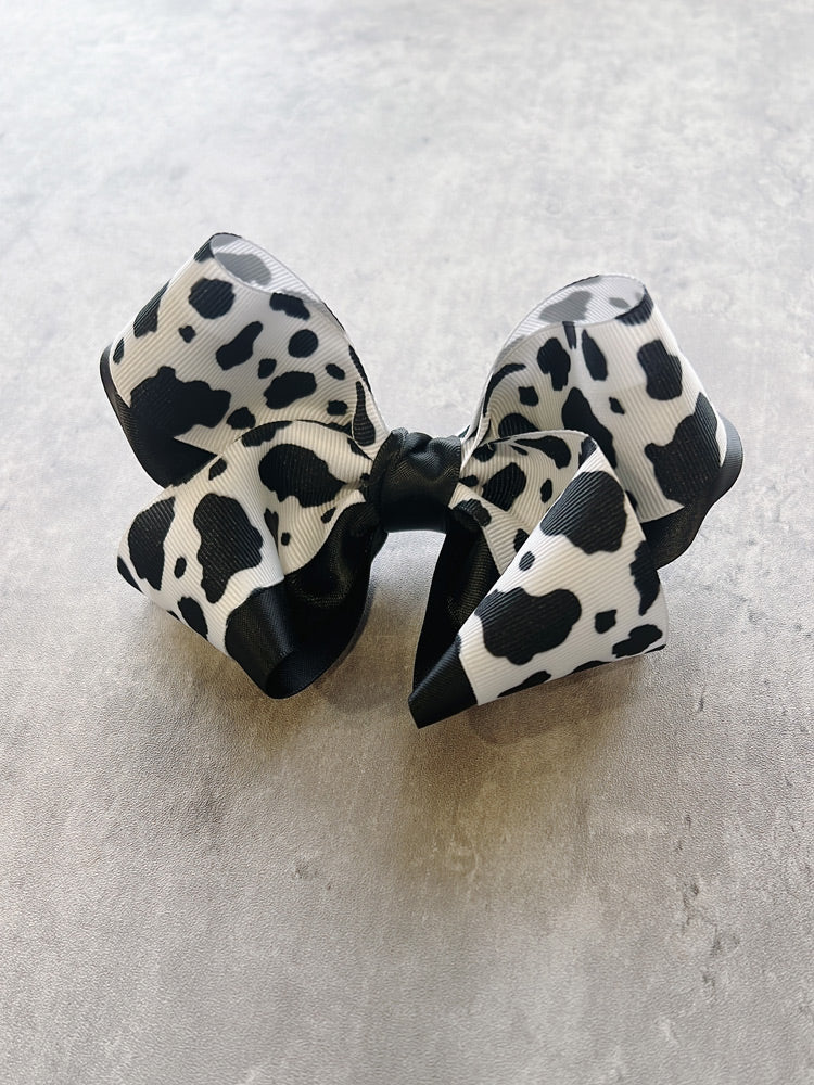 Black and white cow print hair bow