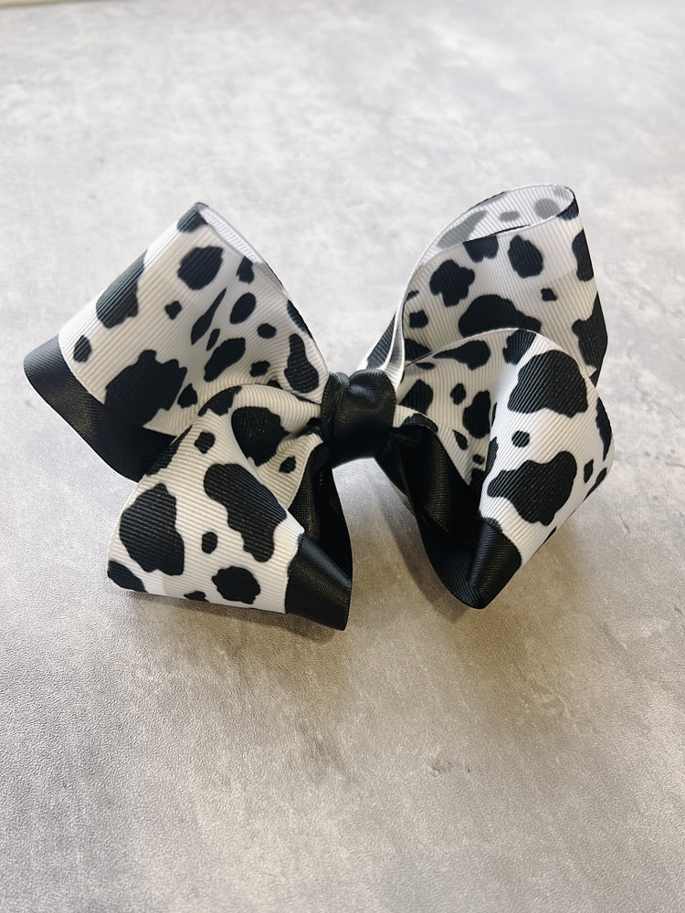 Black and white cow print hair bow