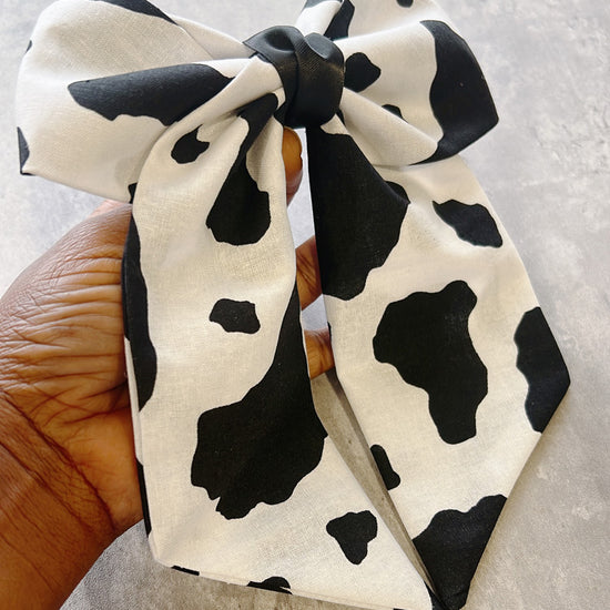 Cow print hair bow