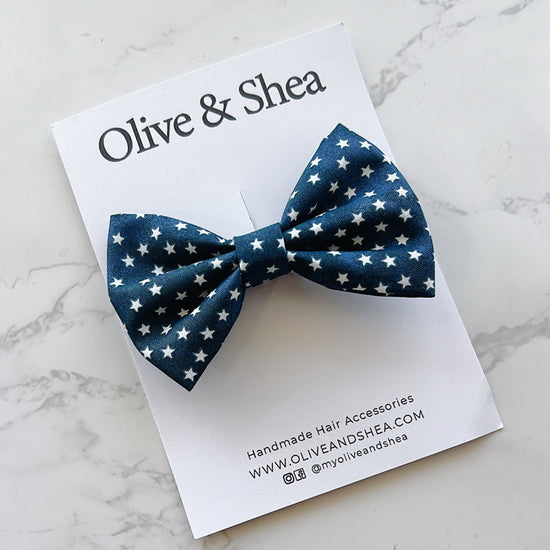 Blue bow tie with white star pattern 