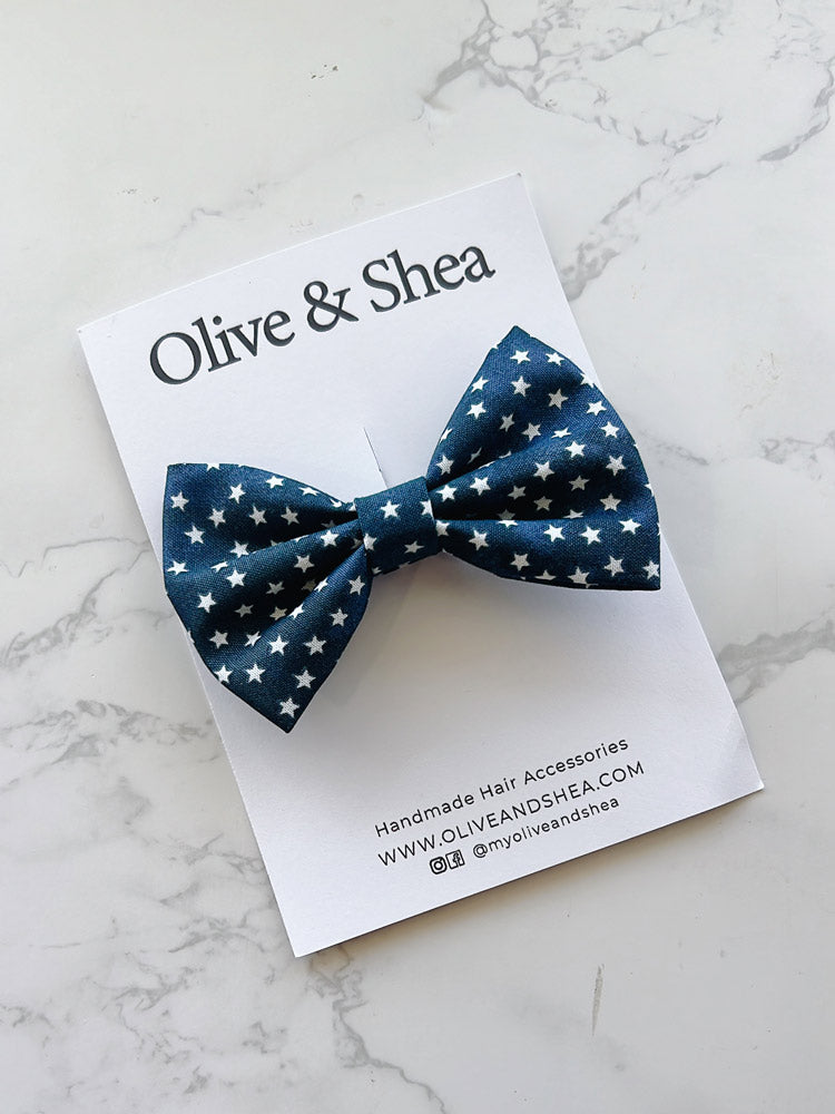 Blue bow tie with white star pattern 