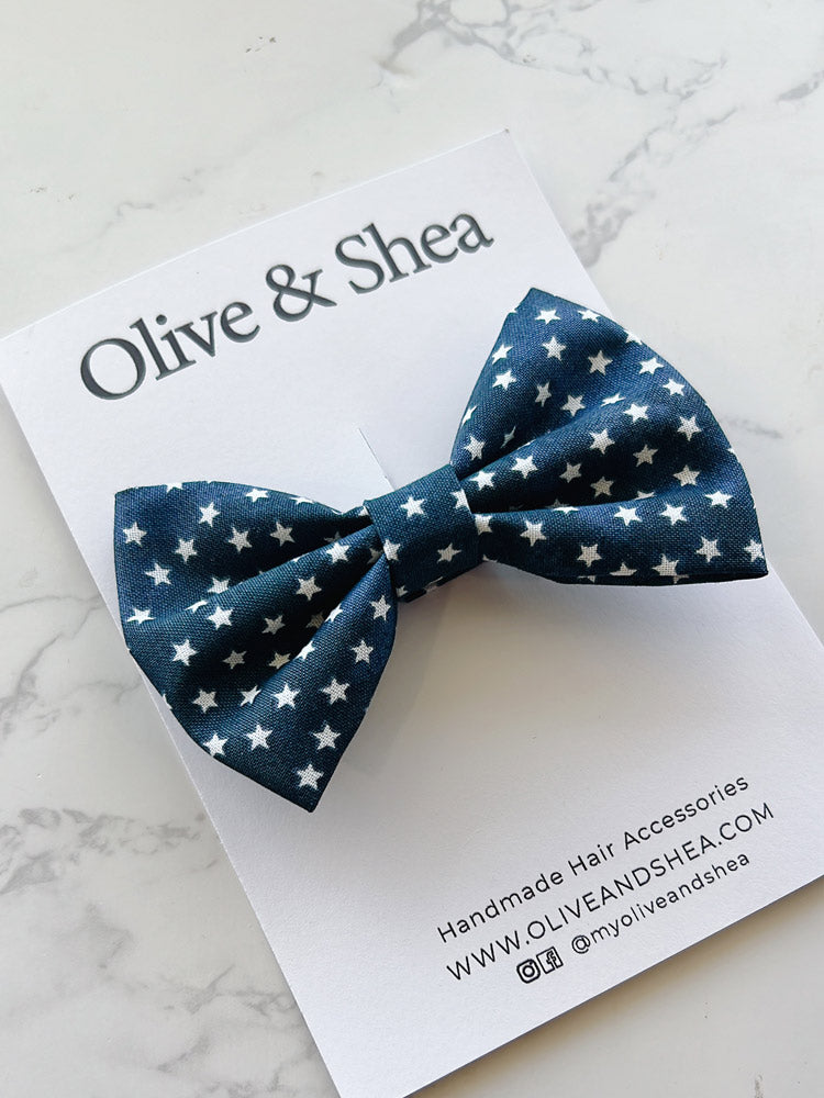 Navy blue bow with white star pattern