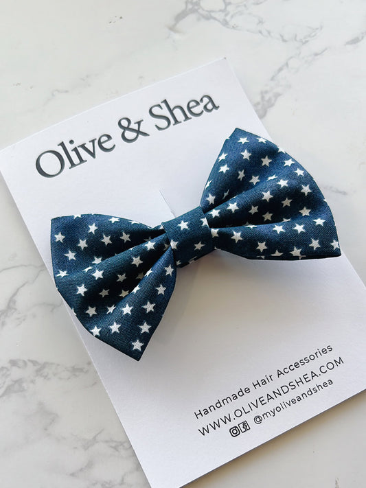 Navy blue bow with white star pattern