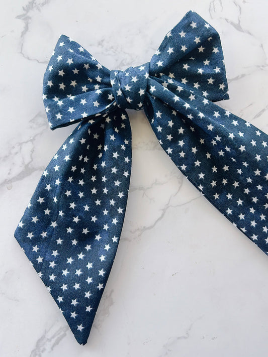 Blue bow tie with white star pattern 
