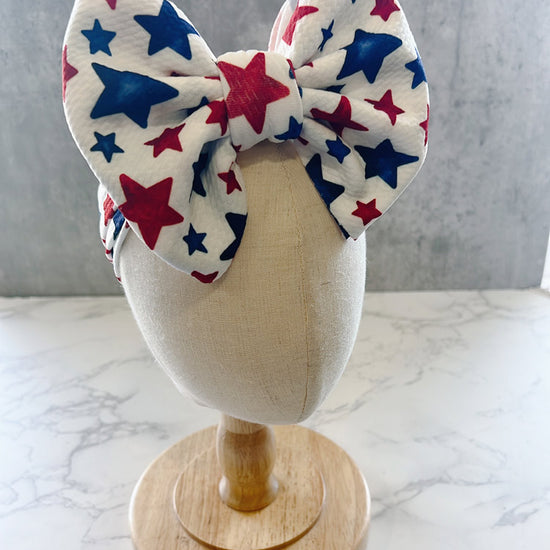 Baby Bow headband with red, white, and blue star pattern for july 4th