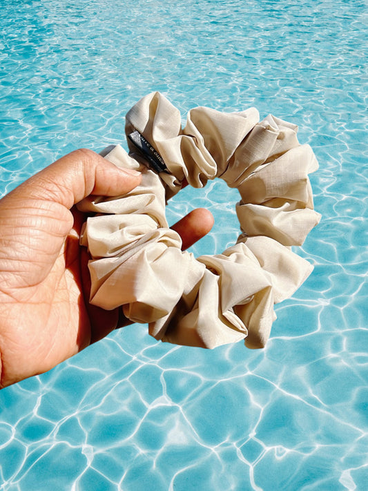 Waterproof swim scrunchie on background